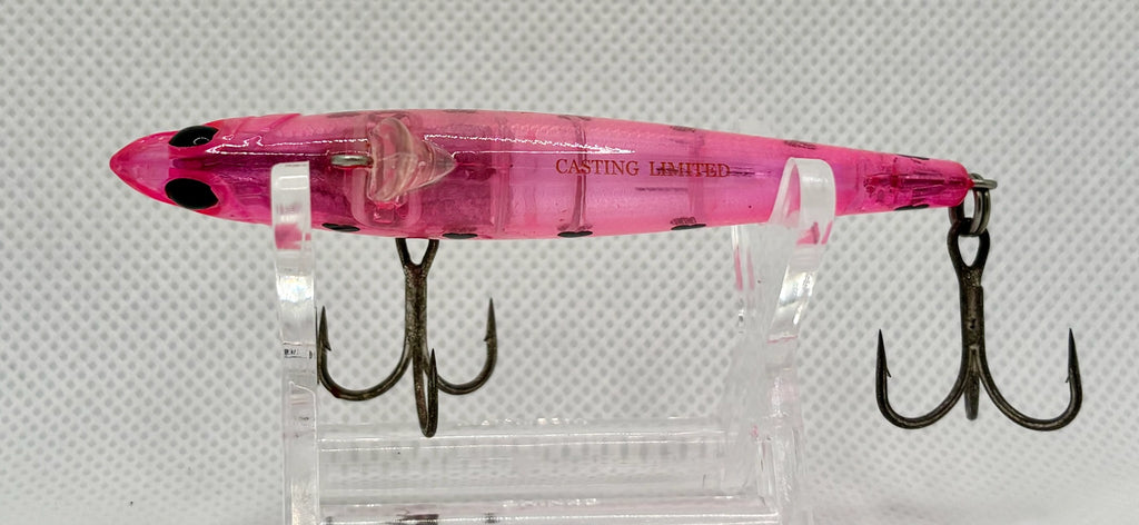 Rolling Bait 77 – three-quarter view showing Casting Limited marking, transparent pink body and black heart detail