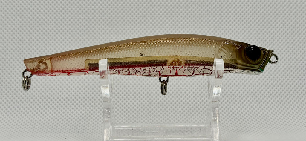 Shell Japan Imagine 101 – opposite side showing crackle red finish on clear body, gold scale detail and split rings