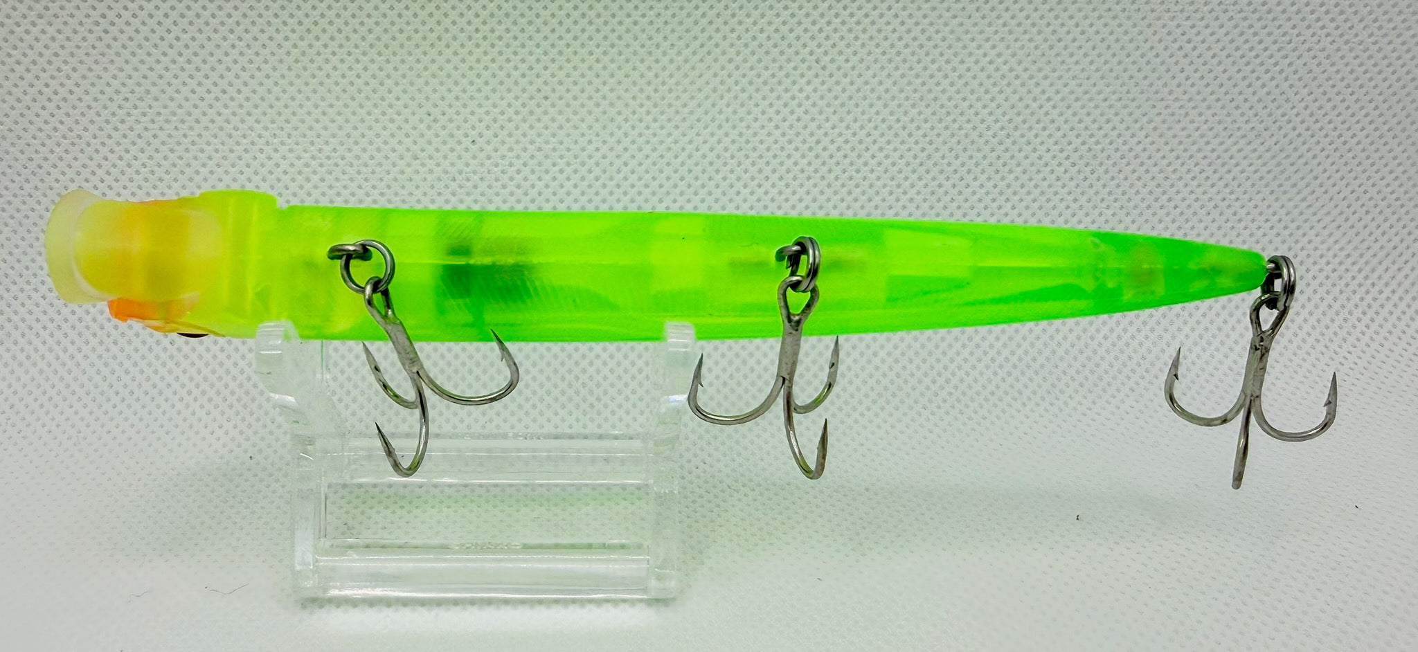 Feed Popper 128mm – belly view showing translucent ghost body and hook hangers