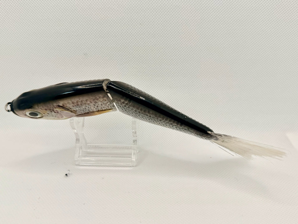 Japanese imported jointed swimbait 140mm – top-down view showing dark black back, articulated body and soft clear tail