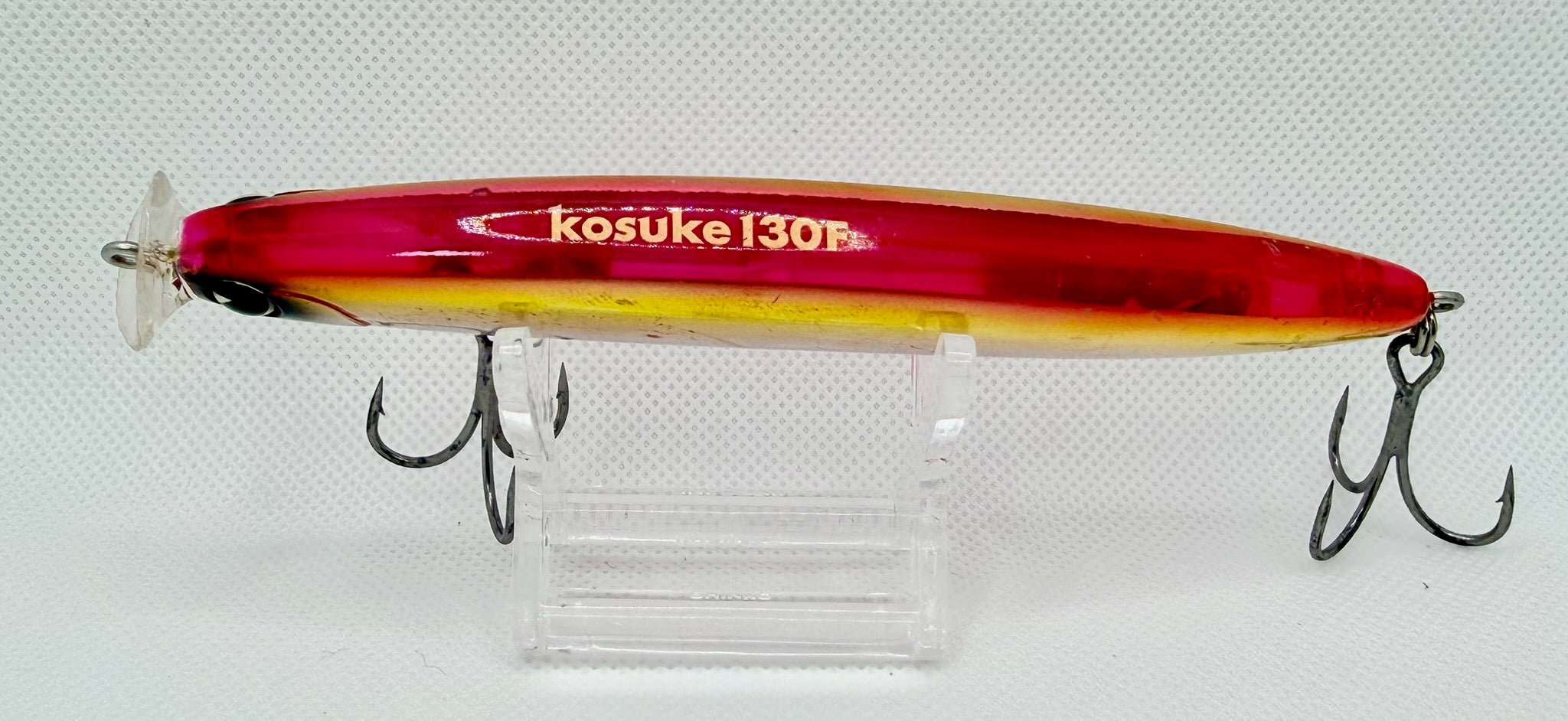 ima Kosuke 130F – side showing Kosuke 130F model script on pink and gold body