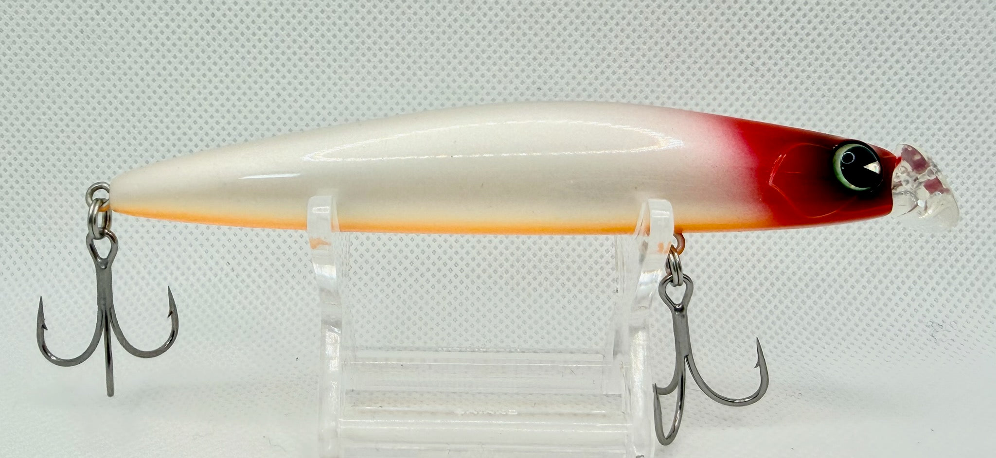 ima Kosuke 110F – reverse side showing full pearl white body, red head and orange belly stripe